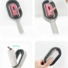 Щітка для вичісування шерсті хатніх тварин 4 в 1 Pet Cleaning Comb з масажем і чищенням речей Pink W28