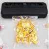 Вакуумний пакувальник Food Vacuum Sealer 65 кПа з різаком і пакетами, чорний
